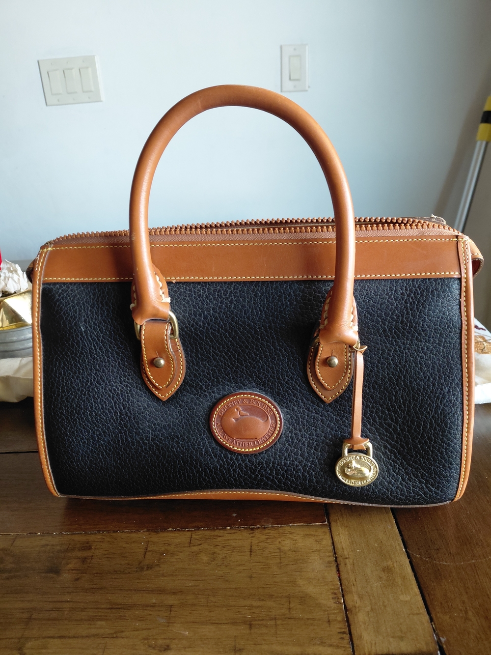 Dooney & Bourke Black with Tan Trim Pebbled Leather Satchel